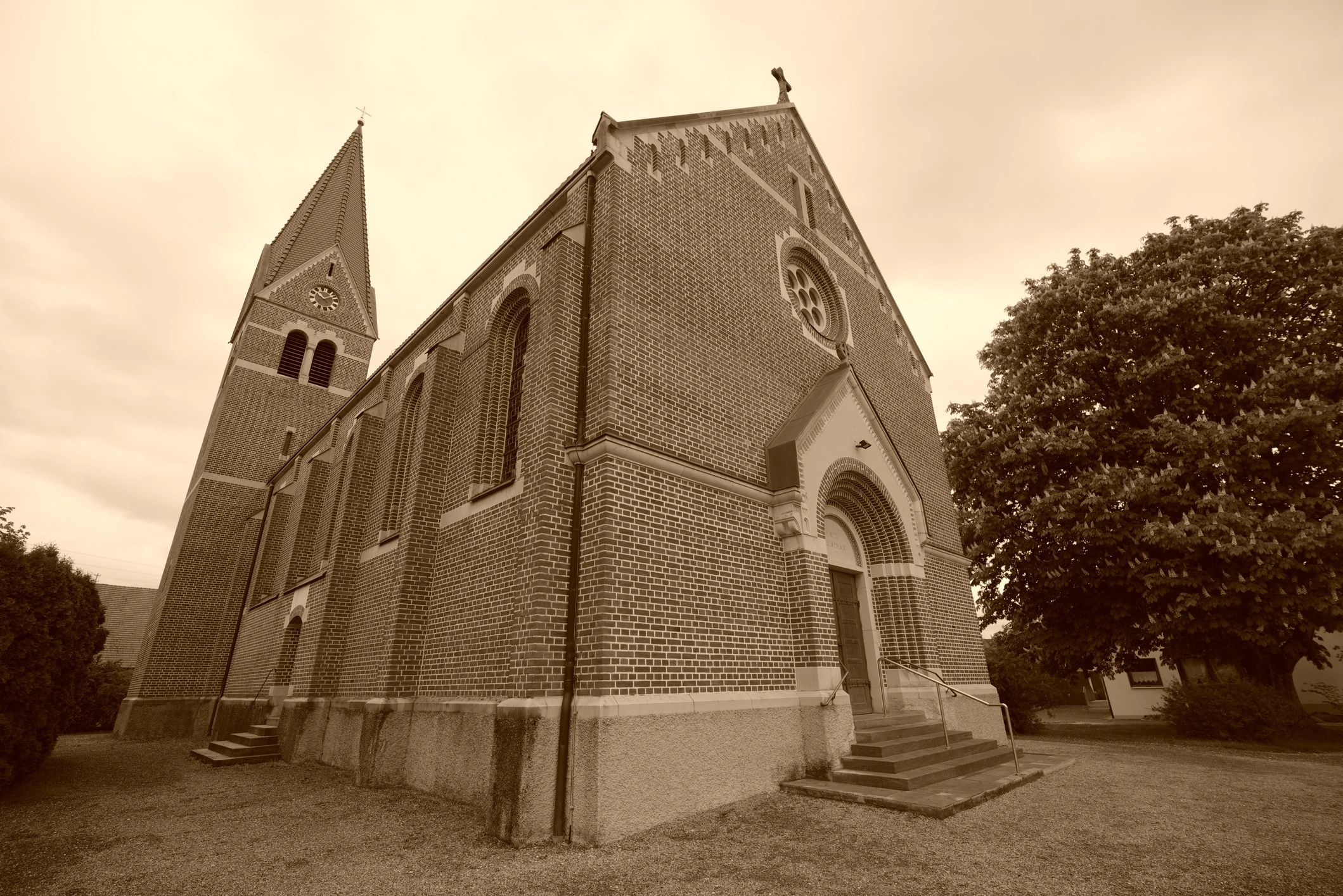 Historic church exterior with sturdy brickwork and tower