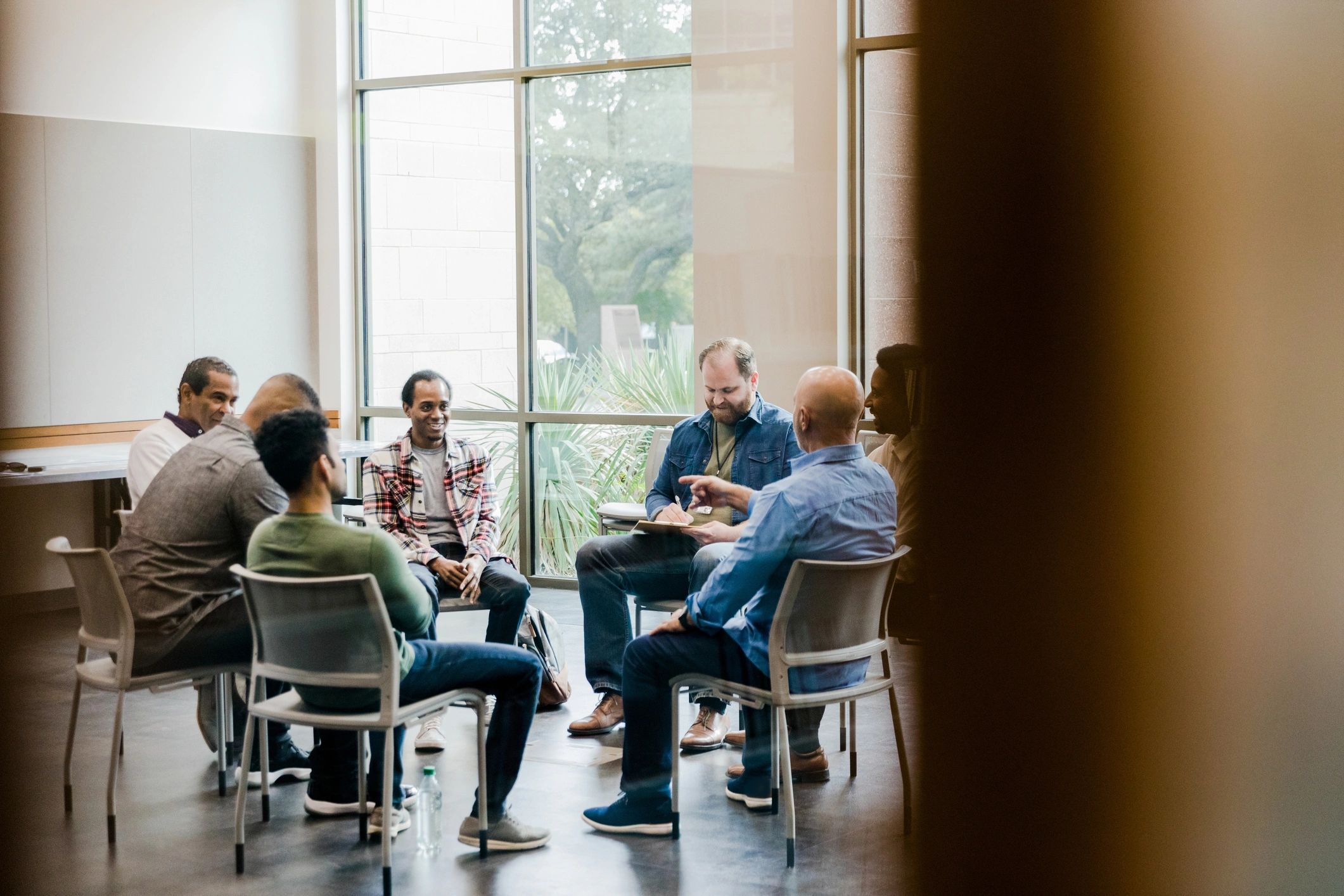 Small group meeting in a church leadership setting